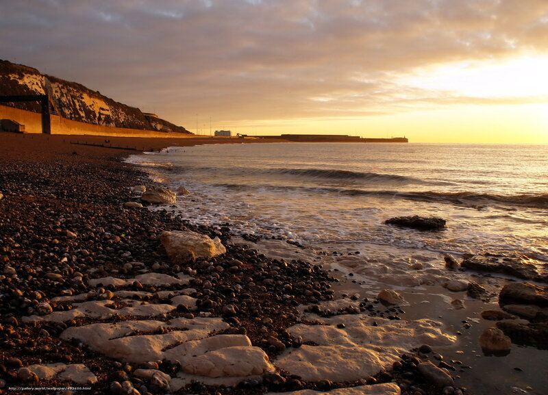 Sunset at a pebble beach