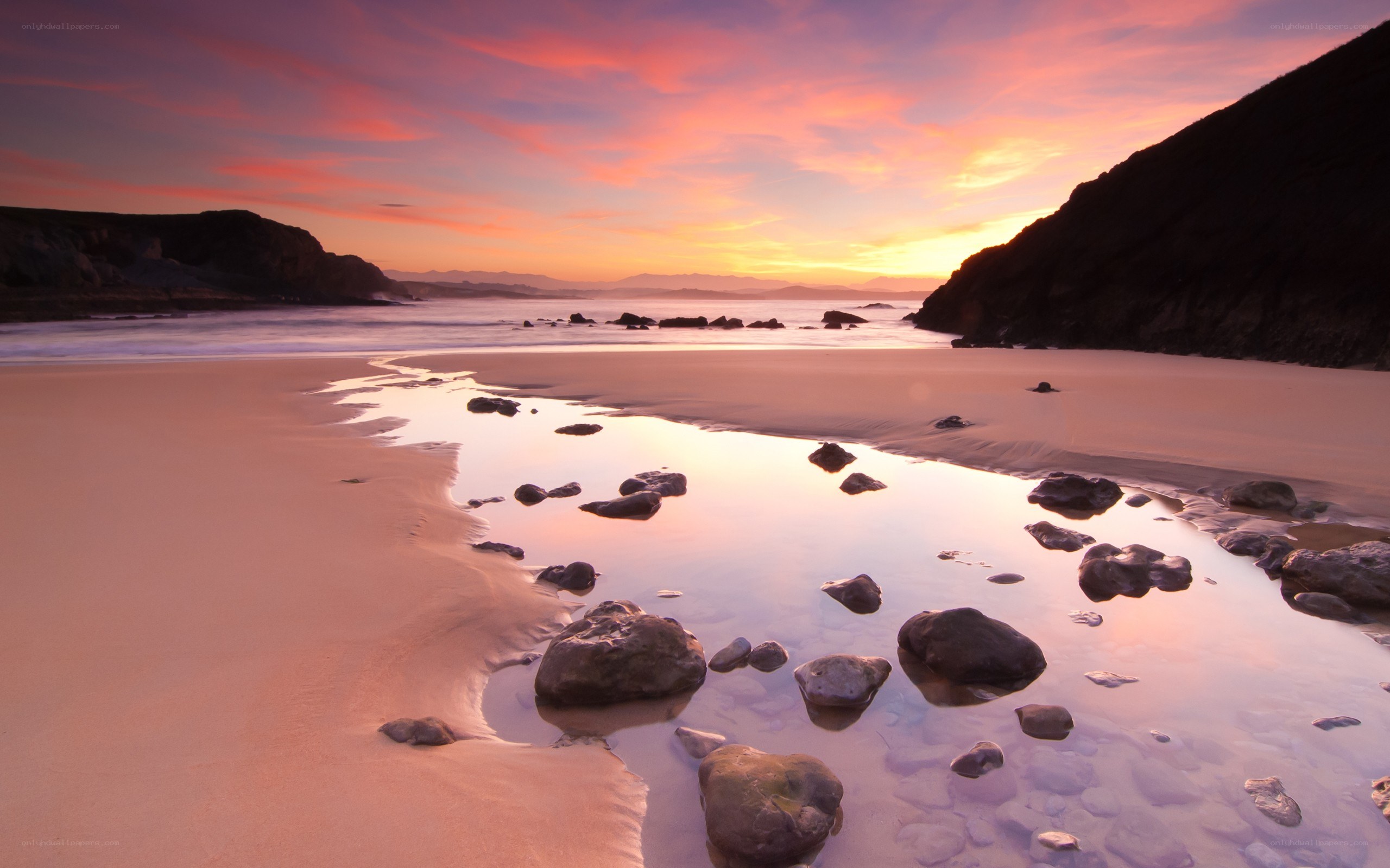 Sunset at a rocky beach