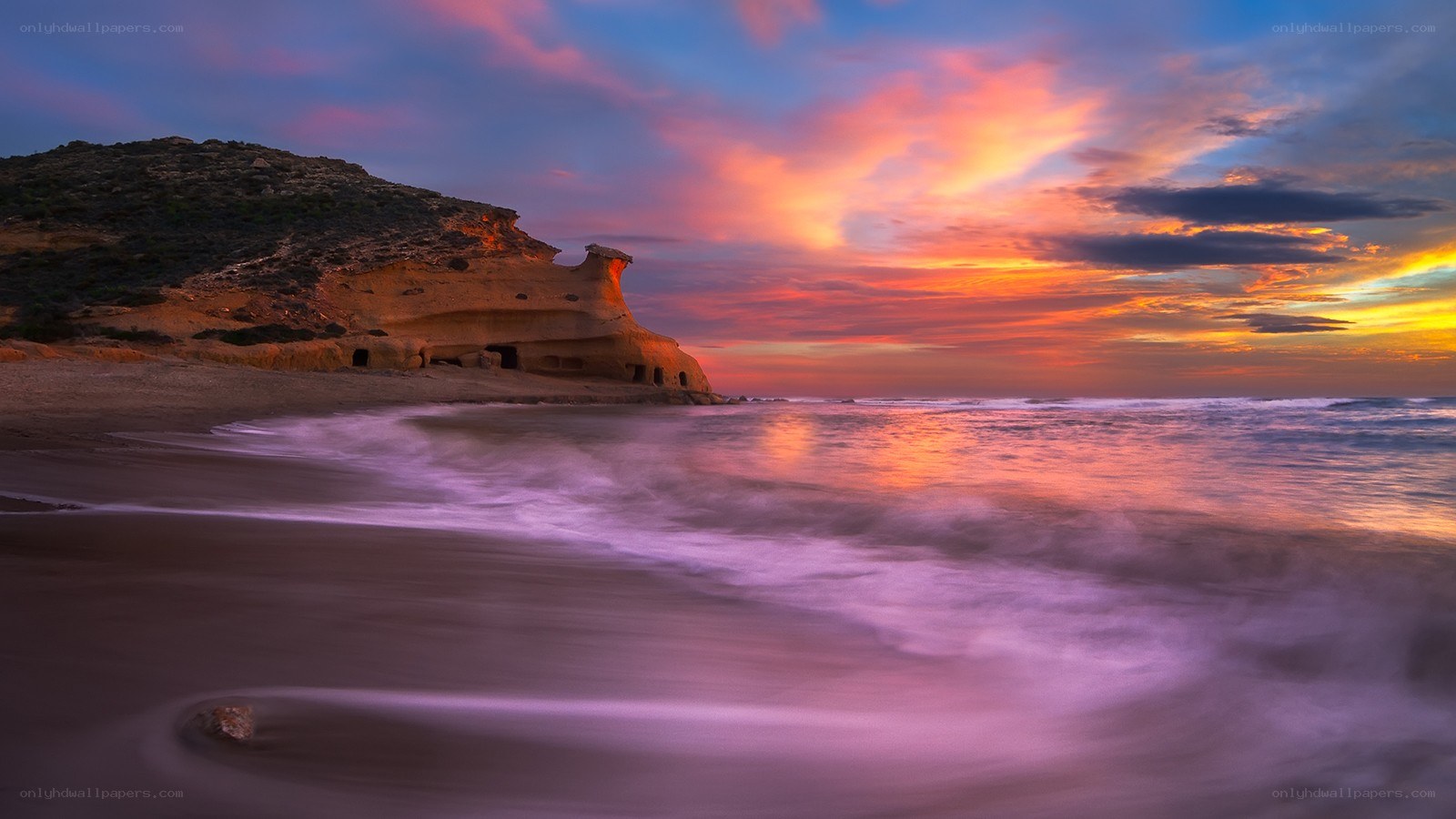 Sunset at a rocky beach