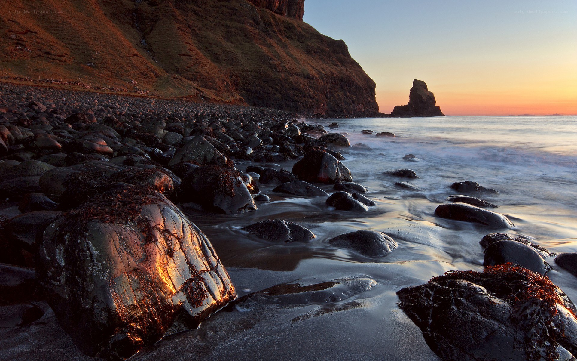 Sunset at a rocky beach