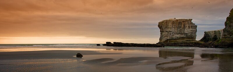 Sunset at a rocky beach