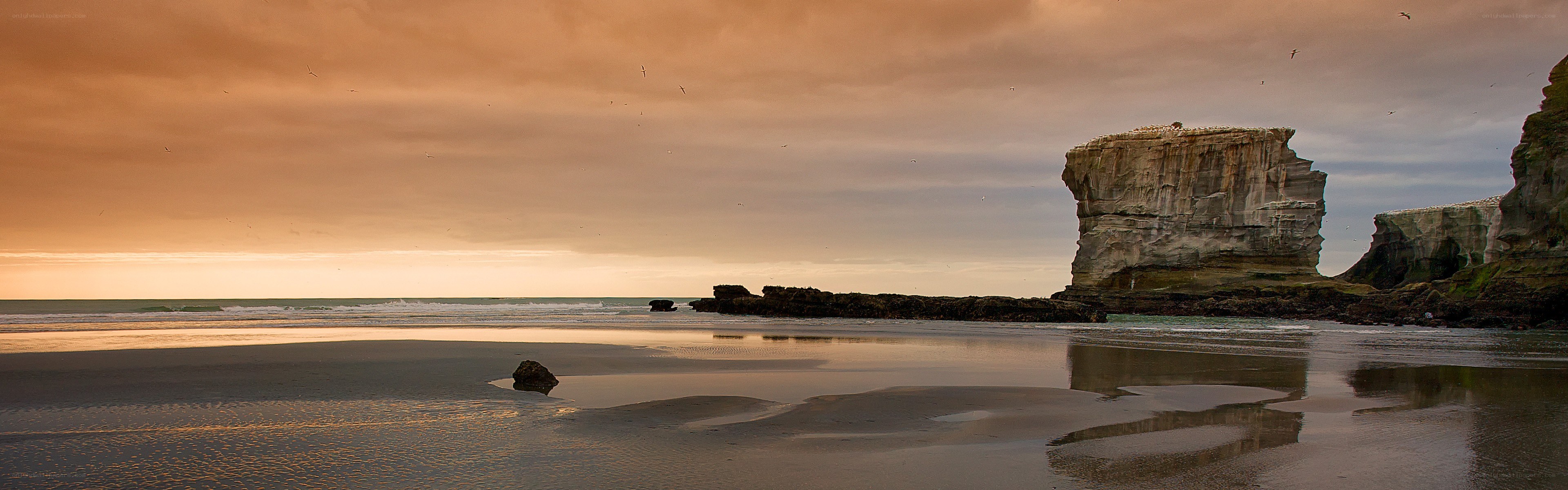 Sunset at a rocky beach
