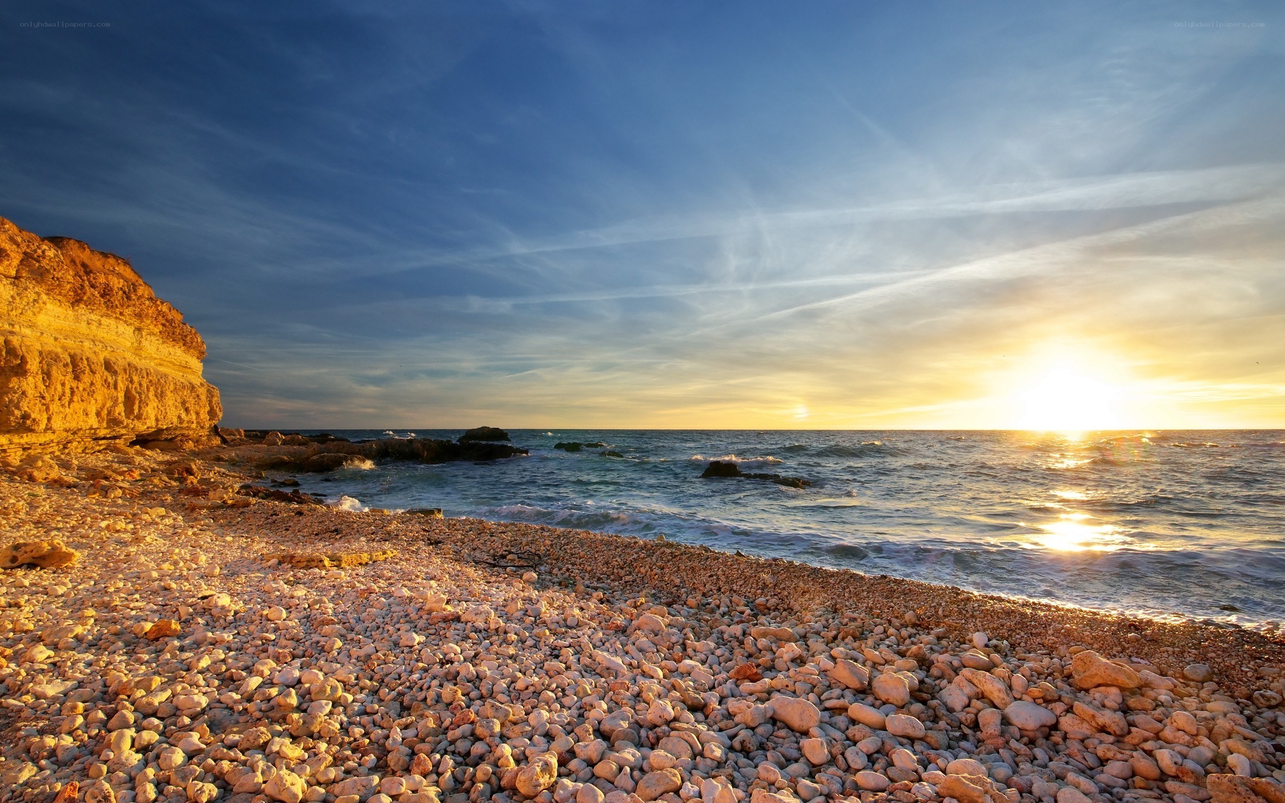 Sunset at a rocky beach