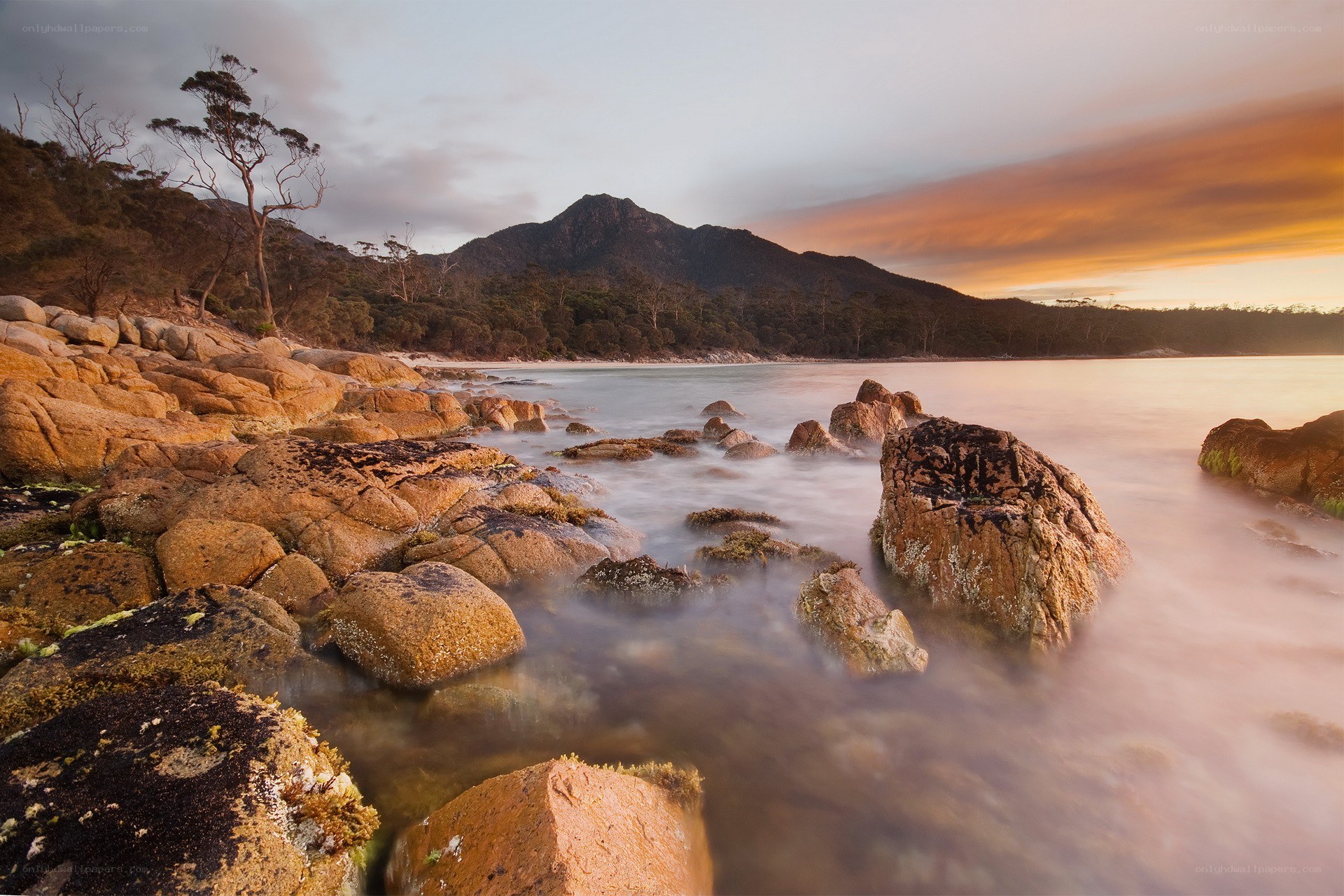 Sunset at a rocky coastline