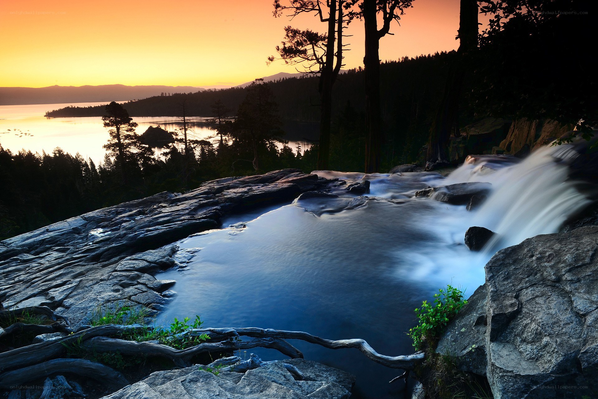 Sunset at a rocky waterfall