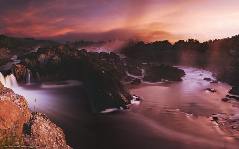 Sunset at a rocky waterfall