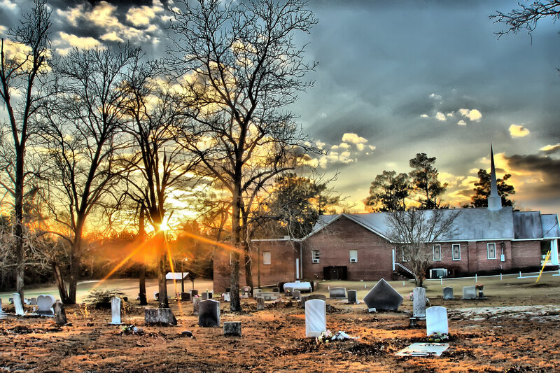 Sunset at a rural church cemetery