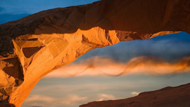 Sunset at a sandstone arch