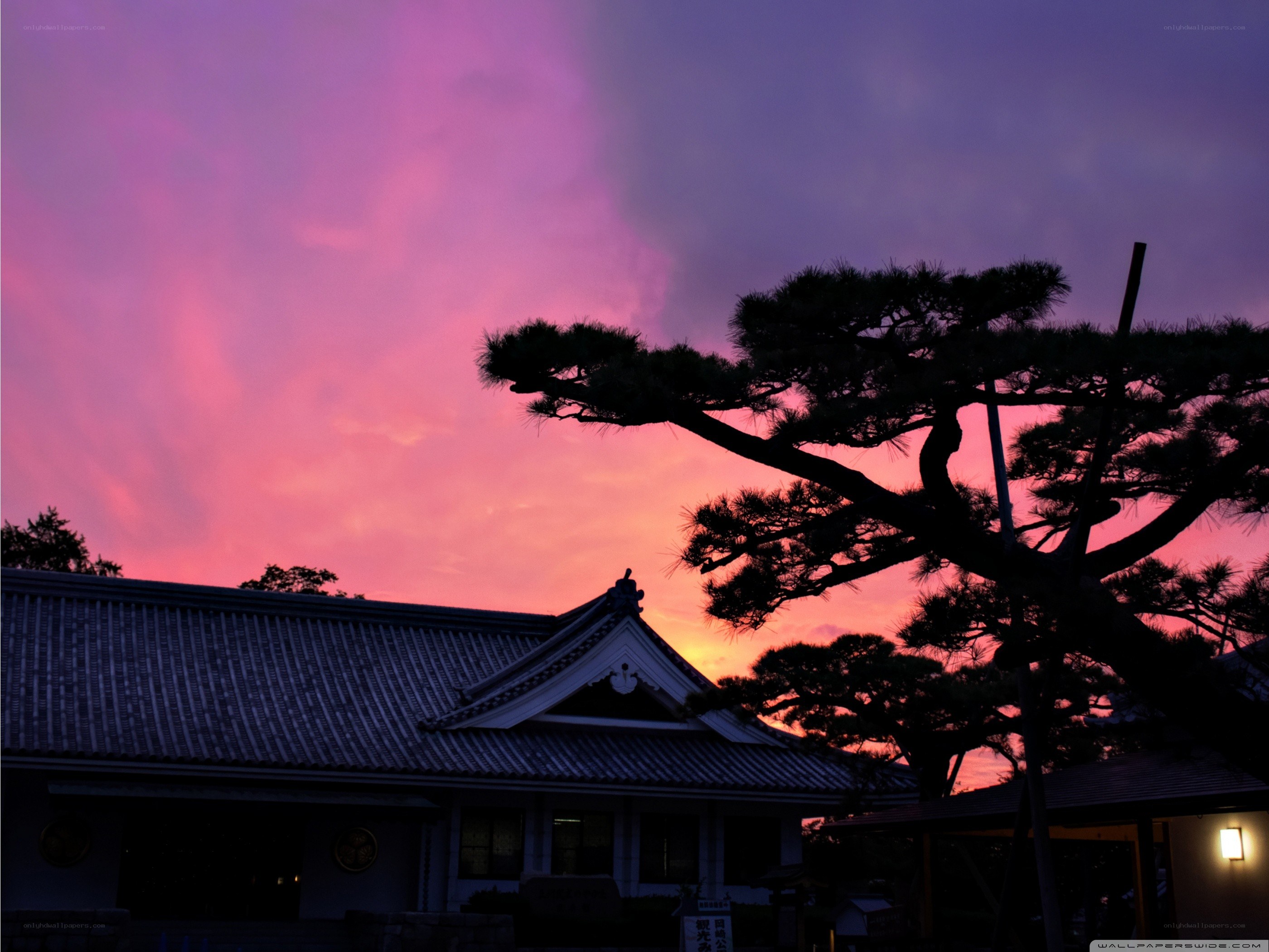 sunset at a traditional japanese building