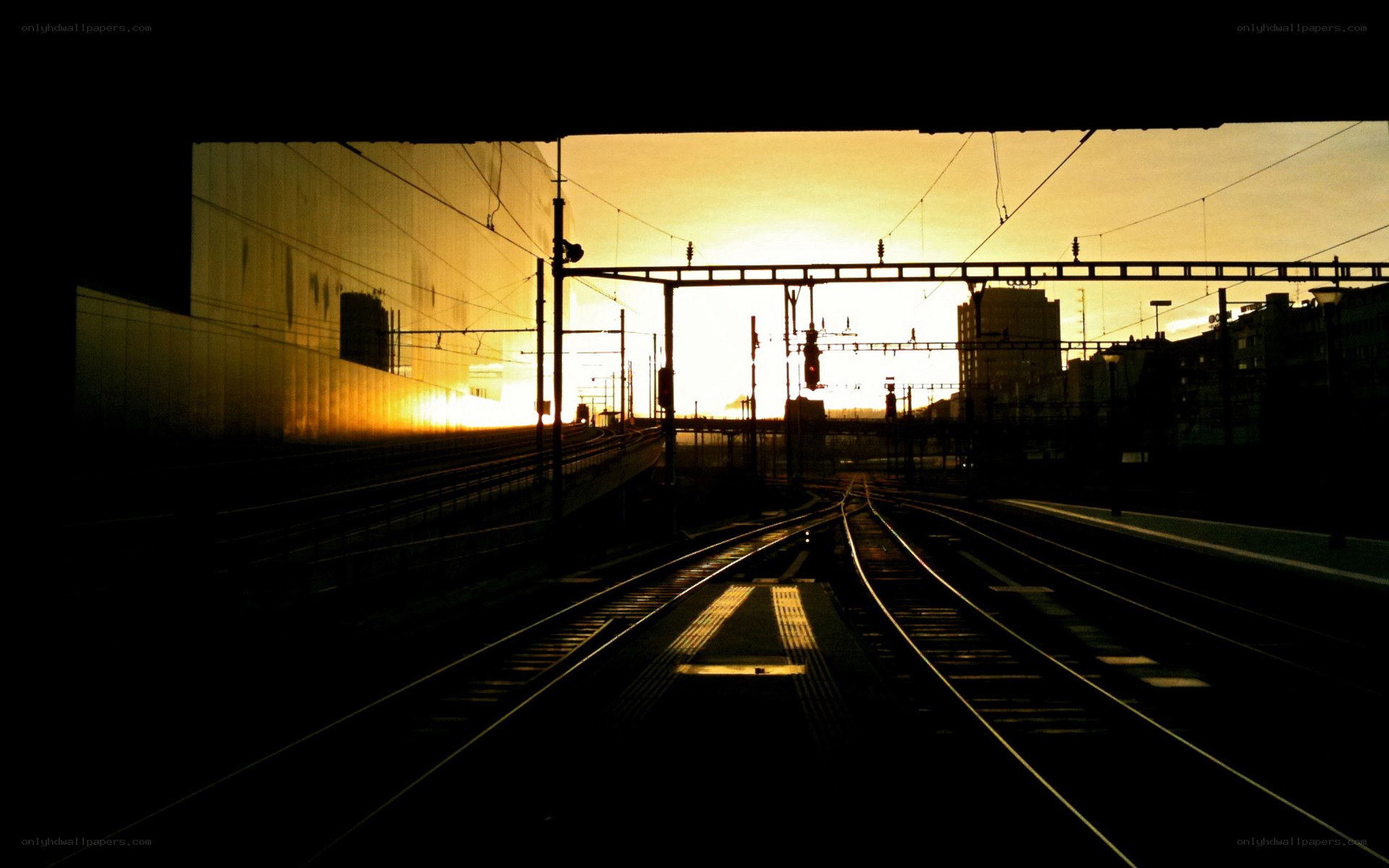 Sunset at a train station