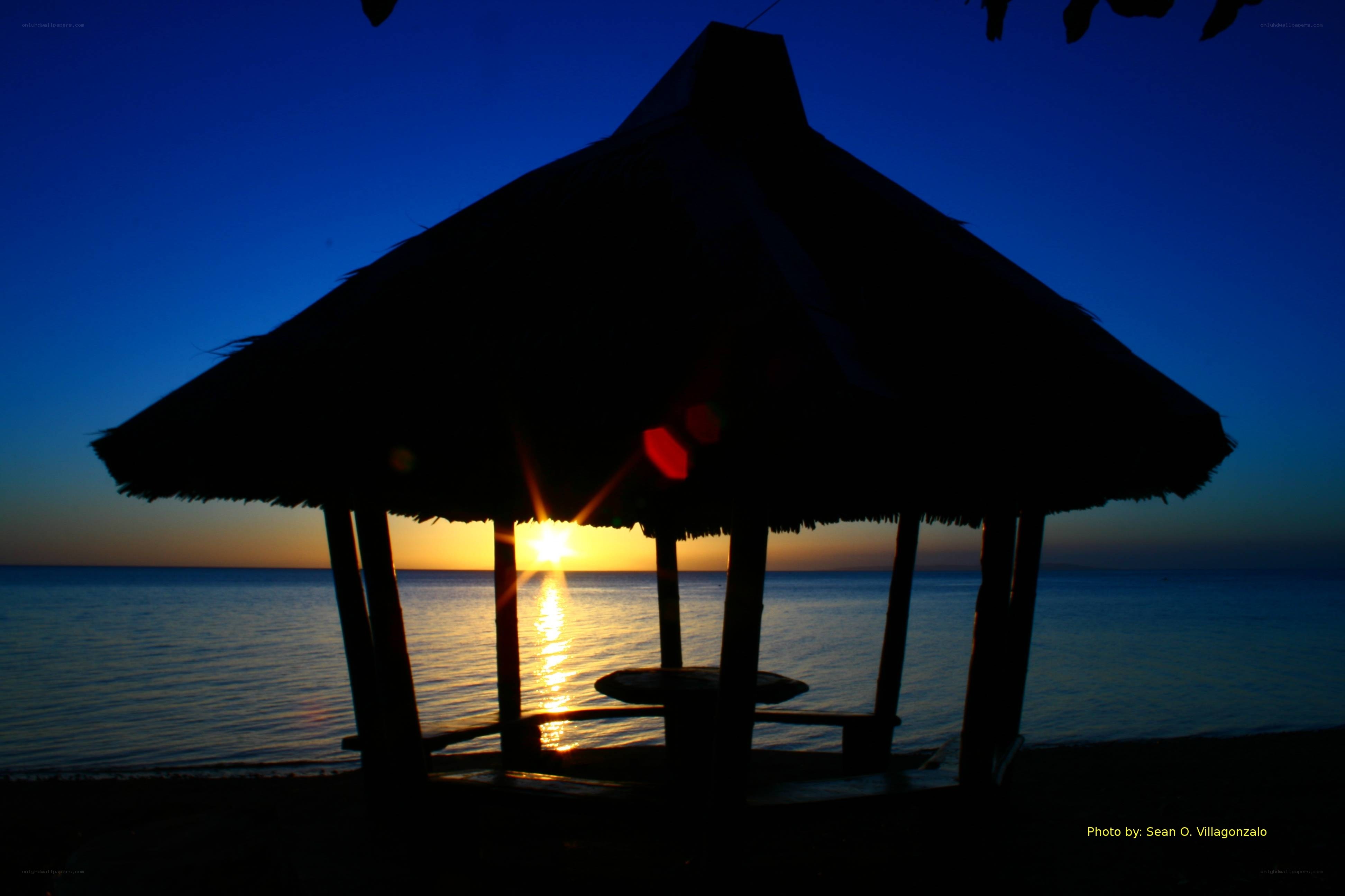 sunset at beach gazebo