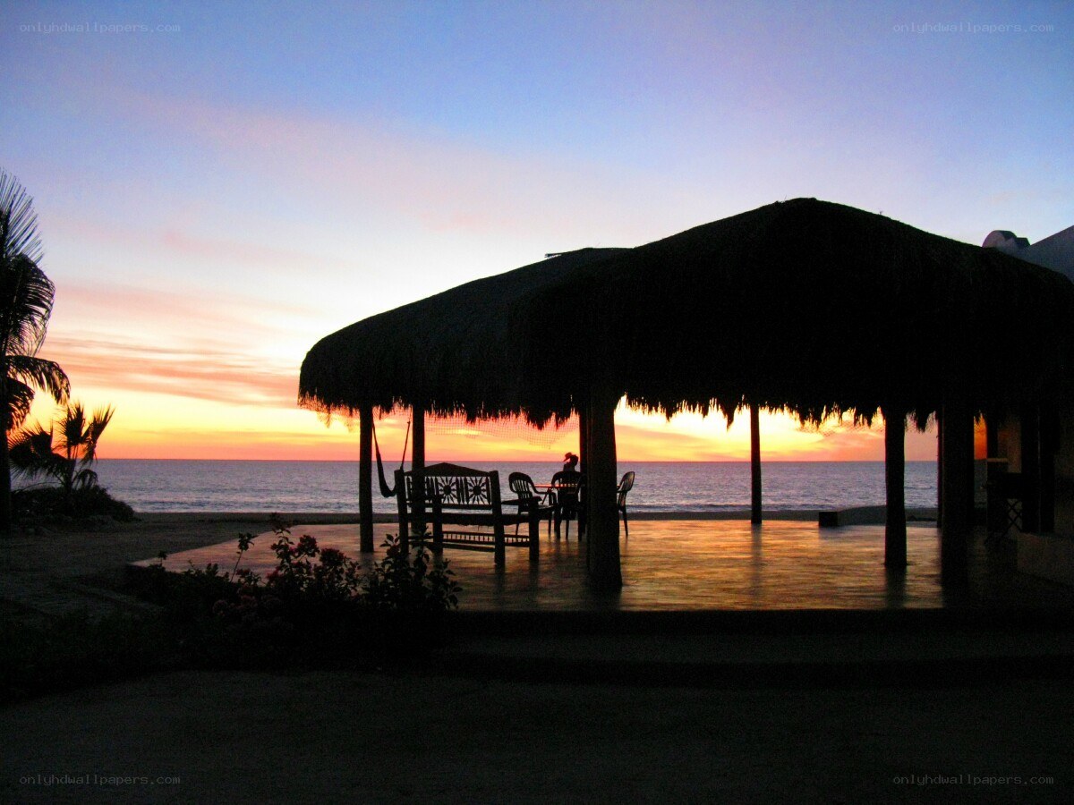 sunset at beach hut