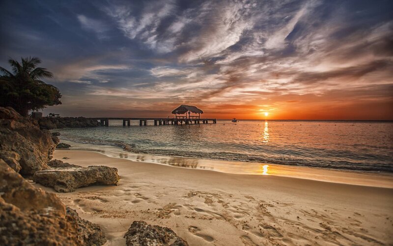 Sunset at Beach Pier — Orange, Serene, Photograph