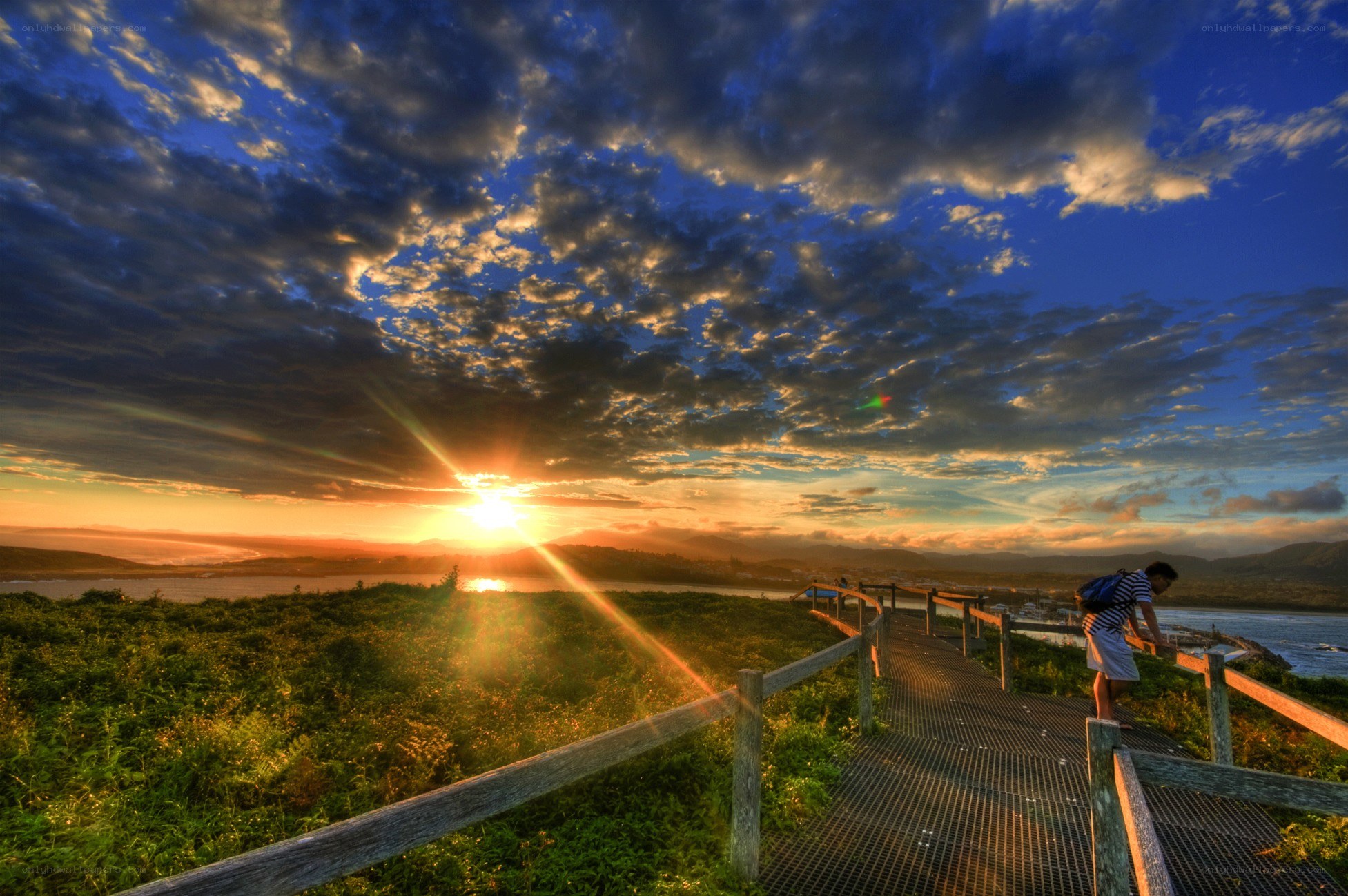 Sunset at coastal boardwalk