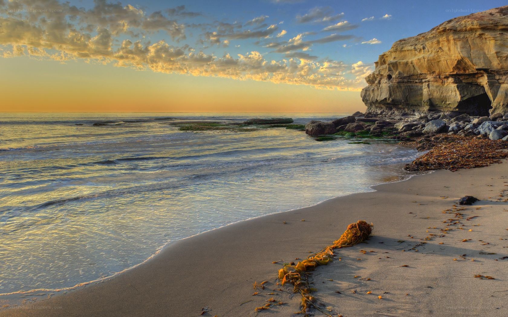 sunset at coastal cliff beach
