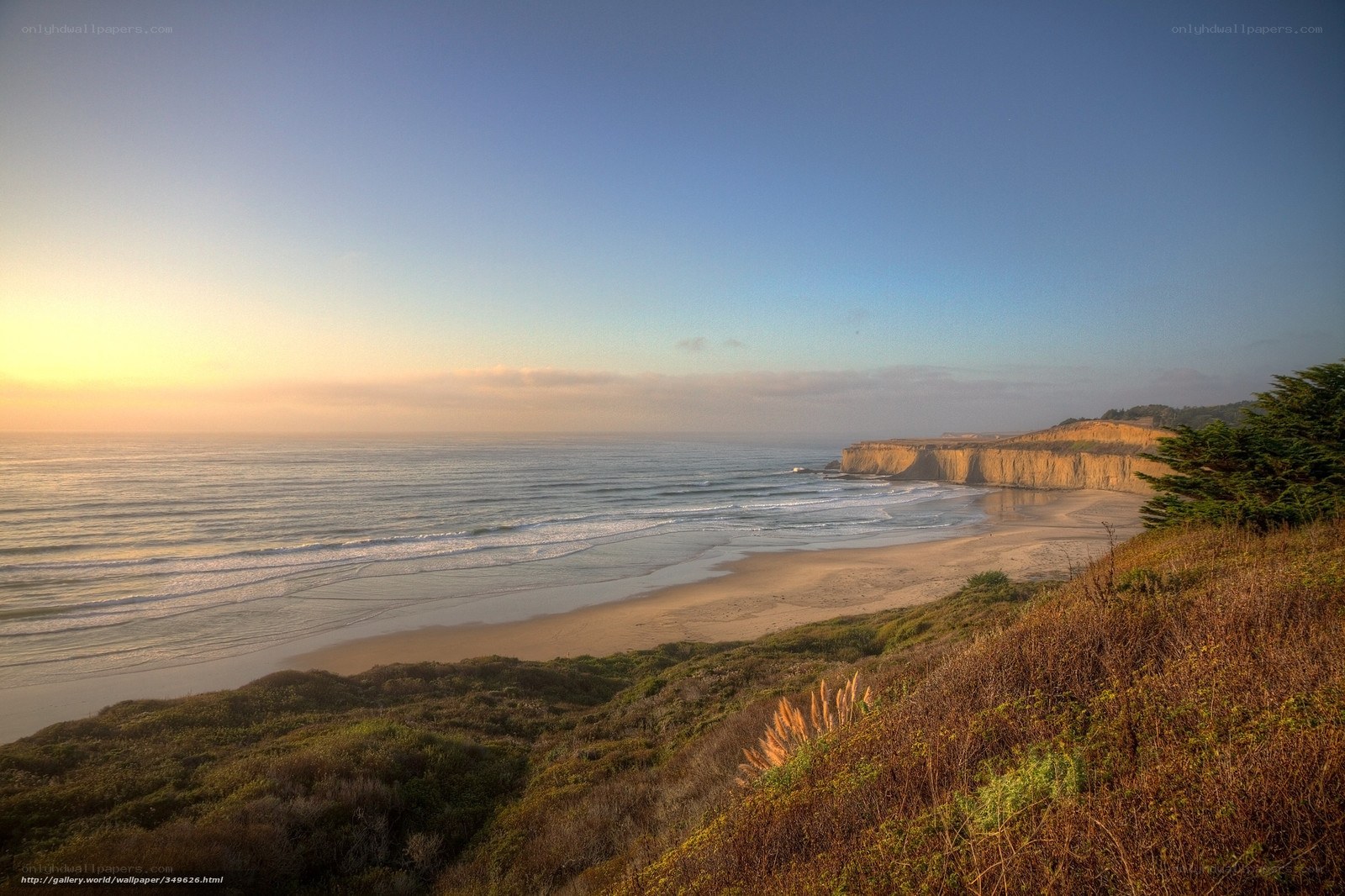 sunset at coastal cliff beach