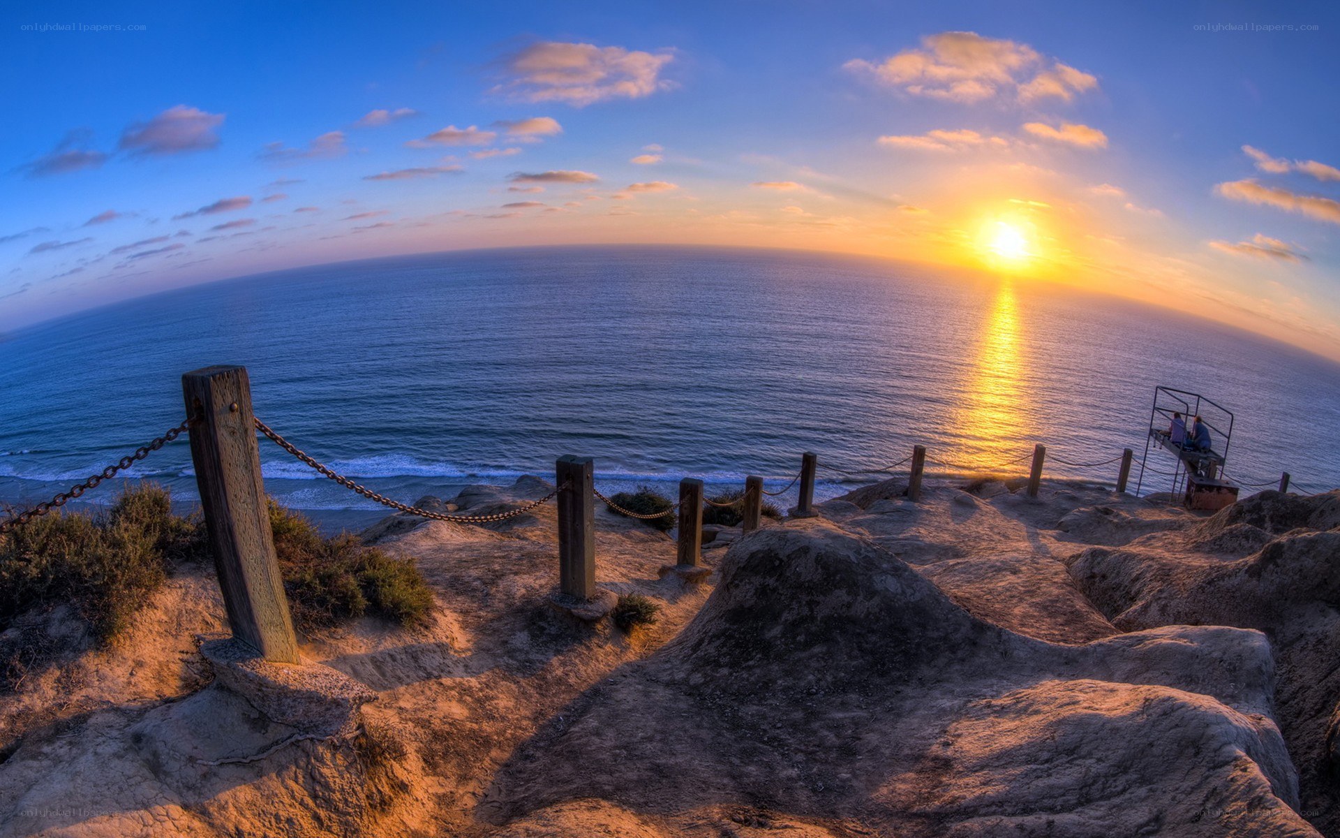 Sunset at coastal cliff overlook
