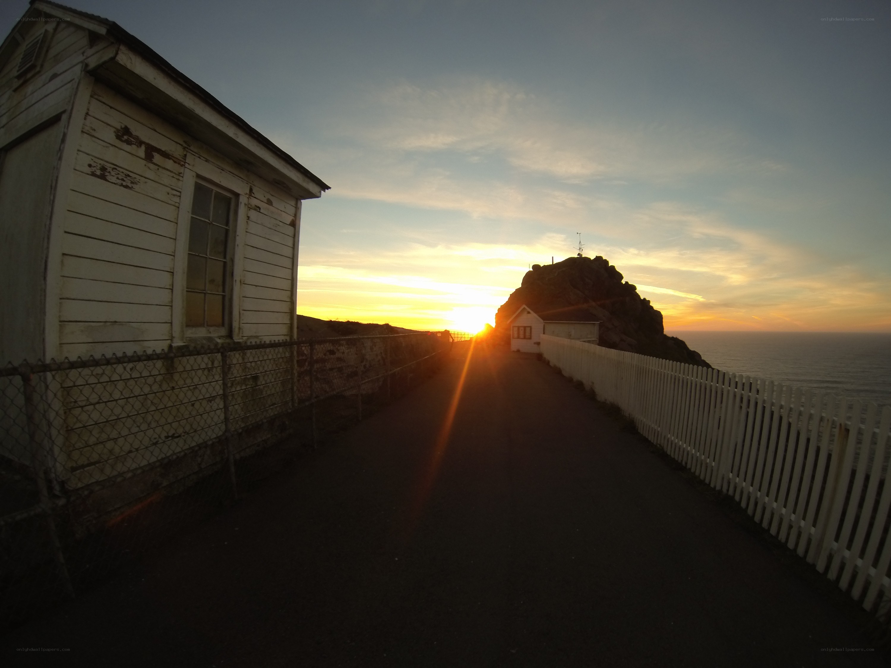 Sunset at coastal lighthouse