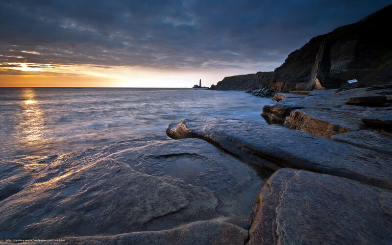 Sunset at coastal lighthouse