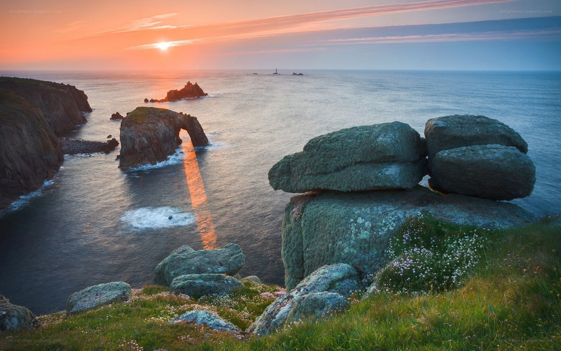 Sunset at coastal rock arch