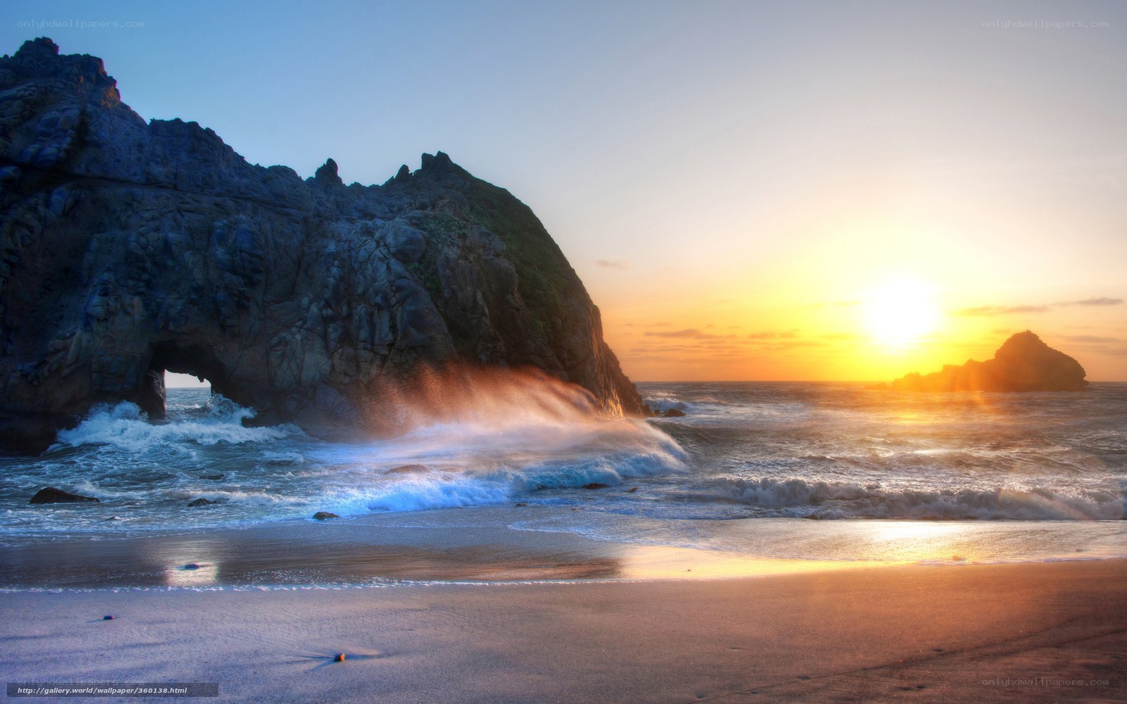 Sunset at coastal rock arch