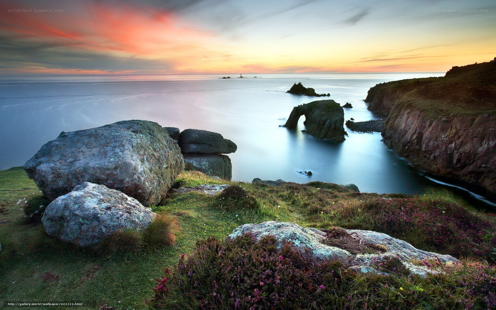 Sunset at coastal rock arch