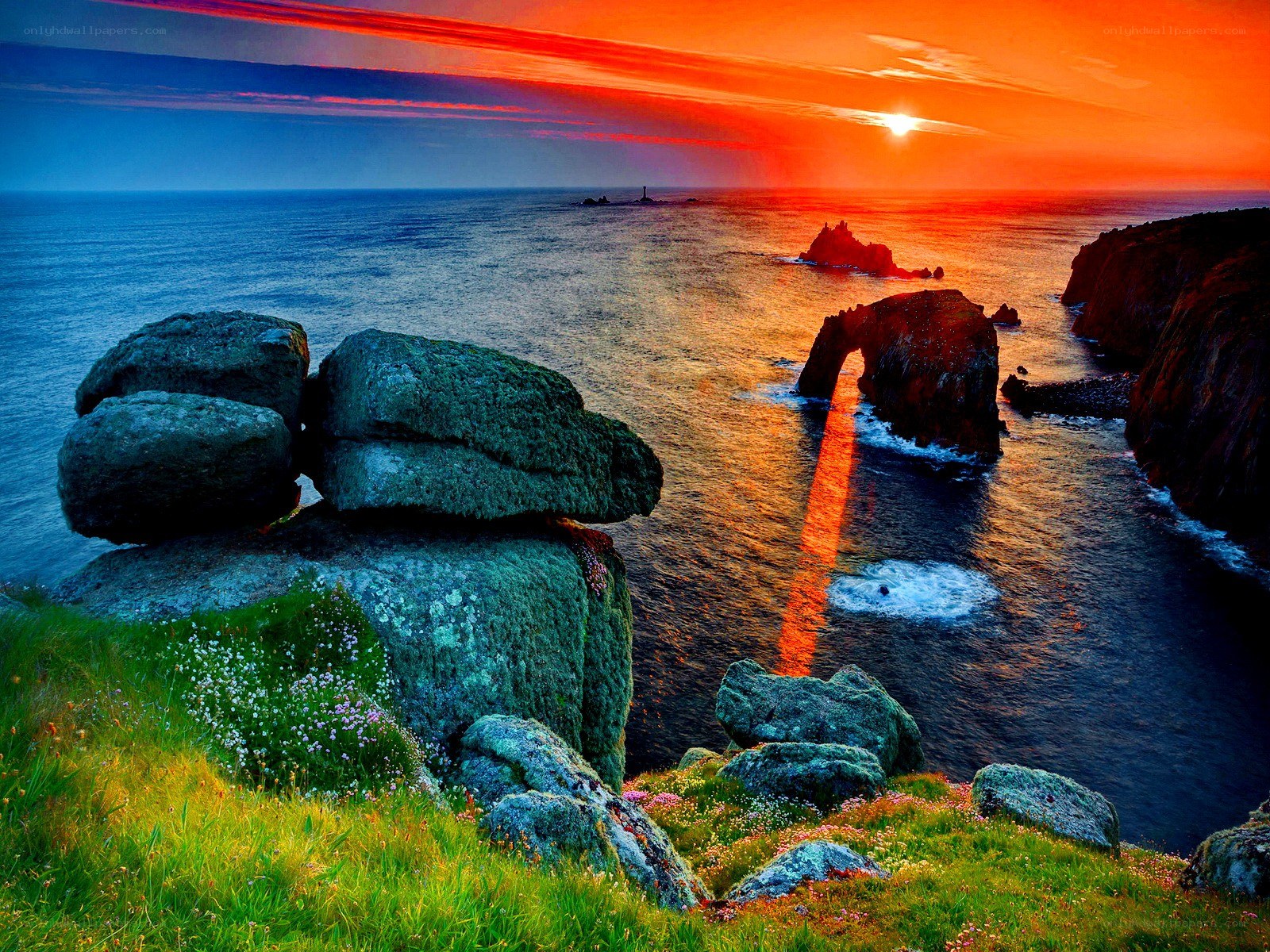 Sunset at coastal rock arch