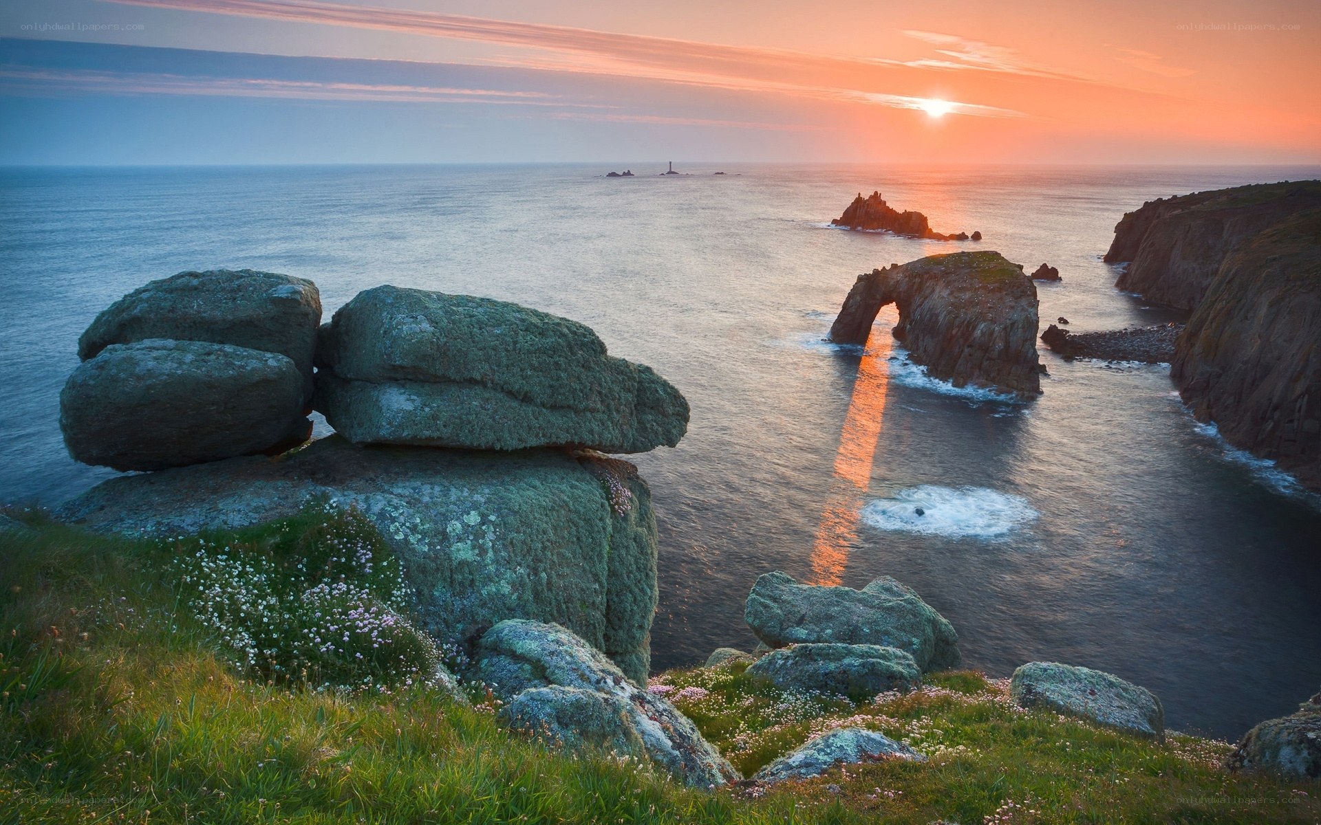 Sunset at coastal rock arch