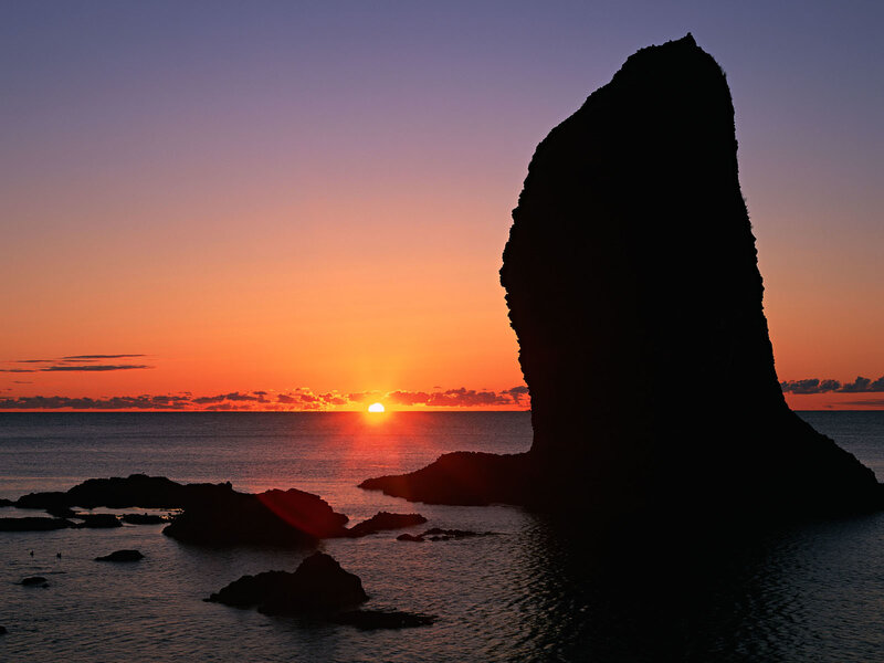 Sunset at coastal rock formation
