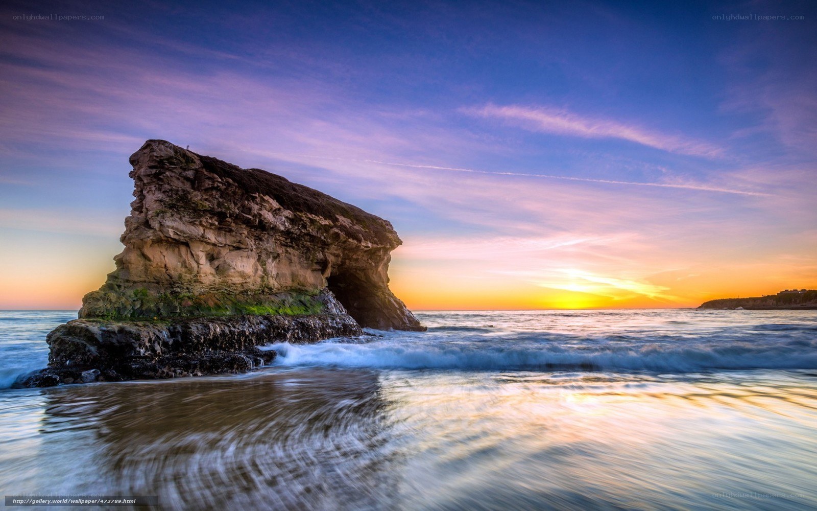 Sunset at coastal rock formation