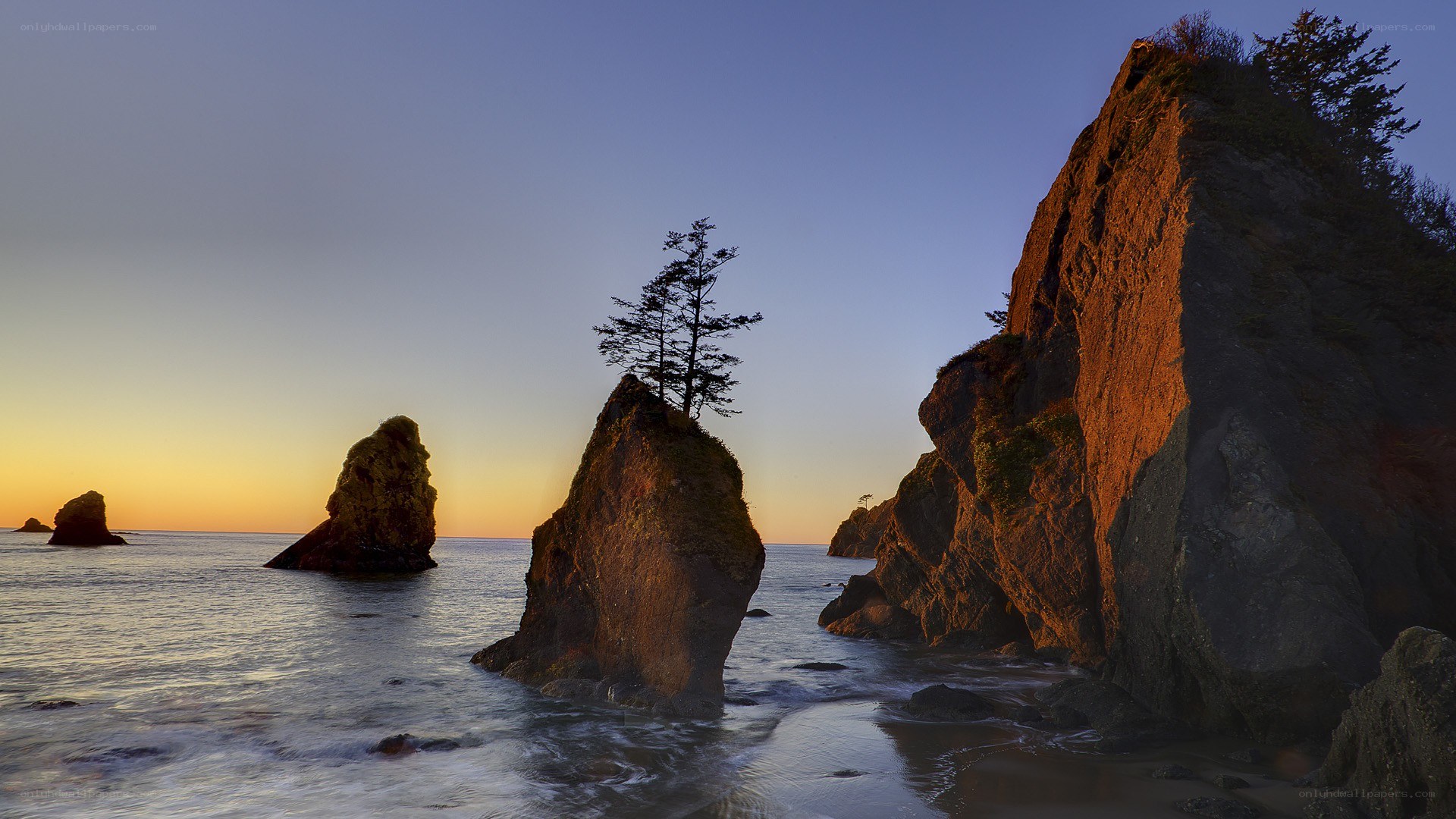Sunset at coastal rock formations