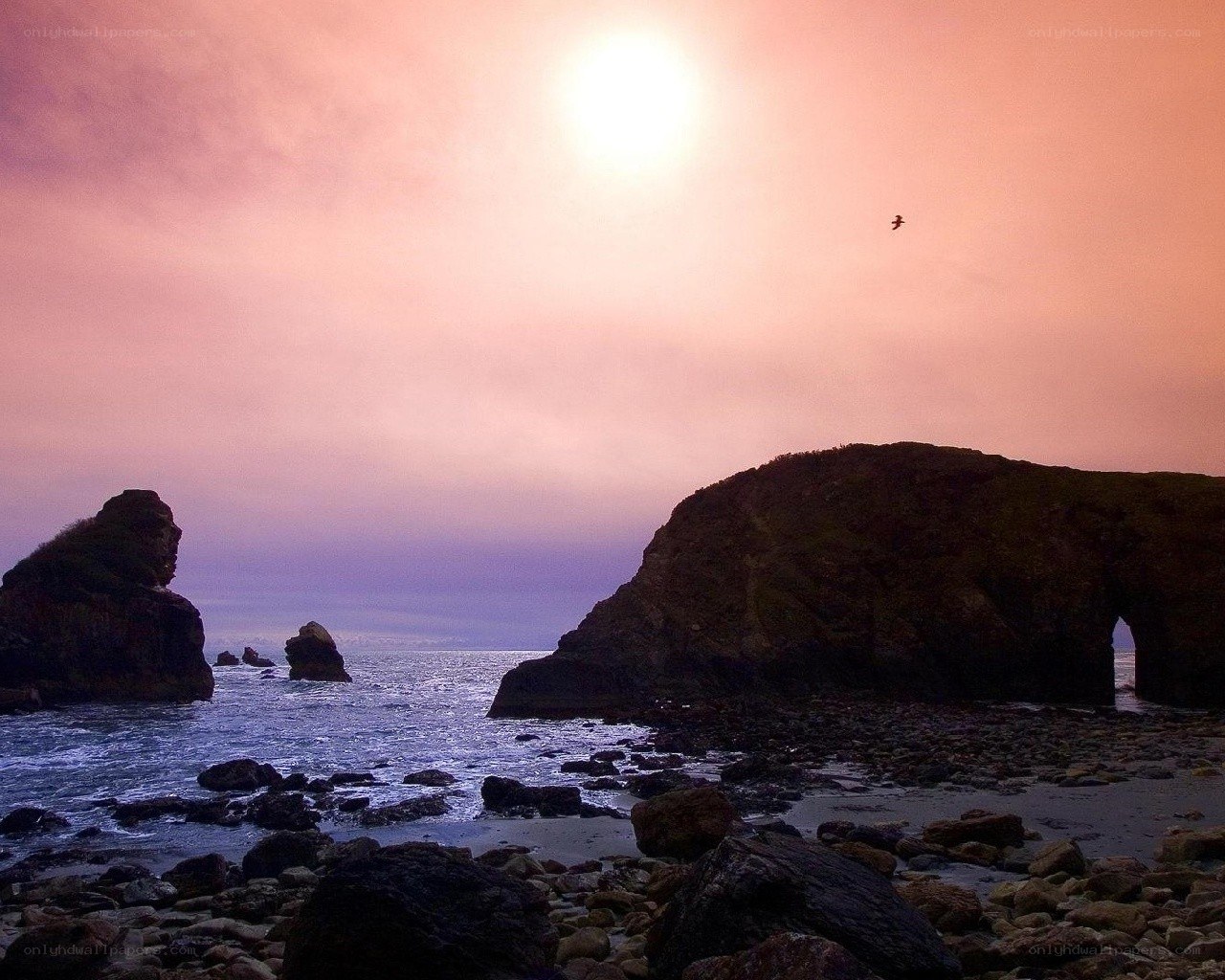 Sunset at coastal rock formations