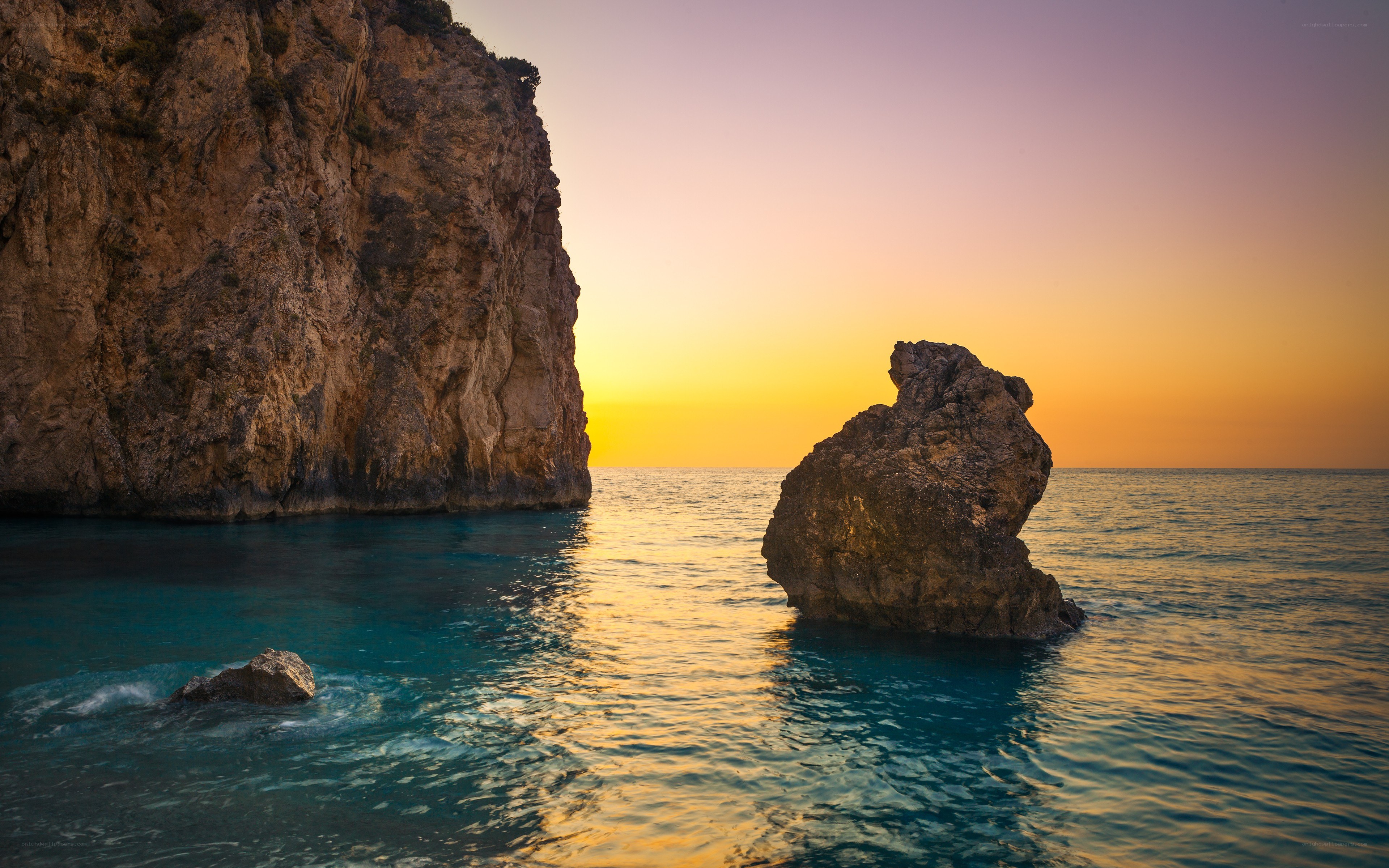 Sunset at coastal rock formations
