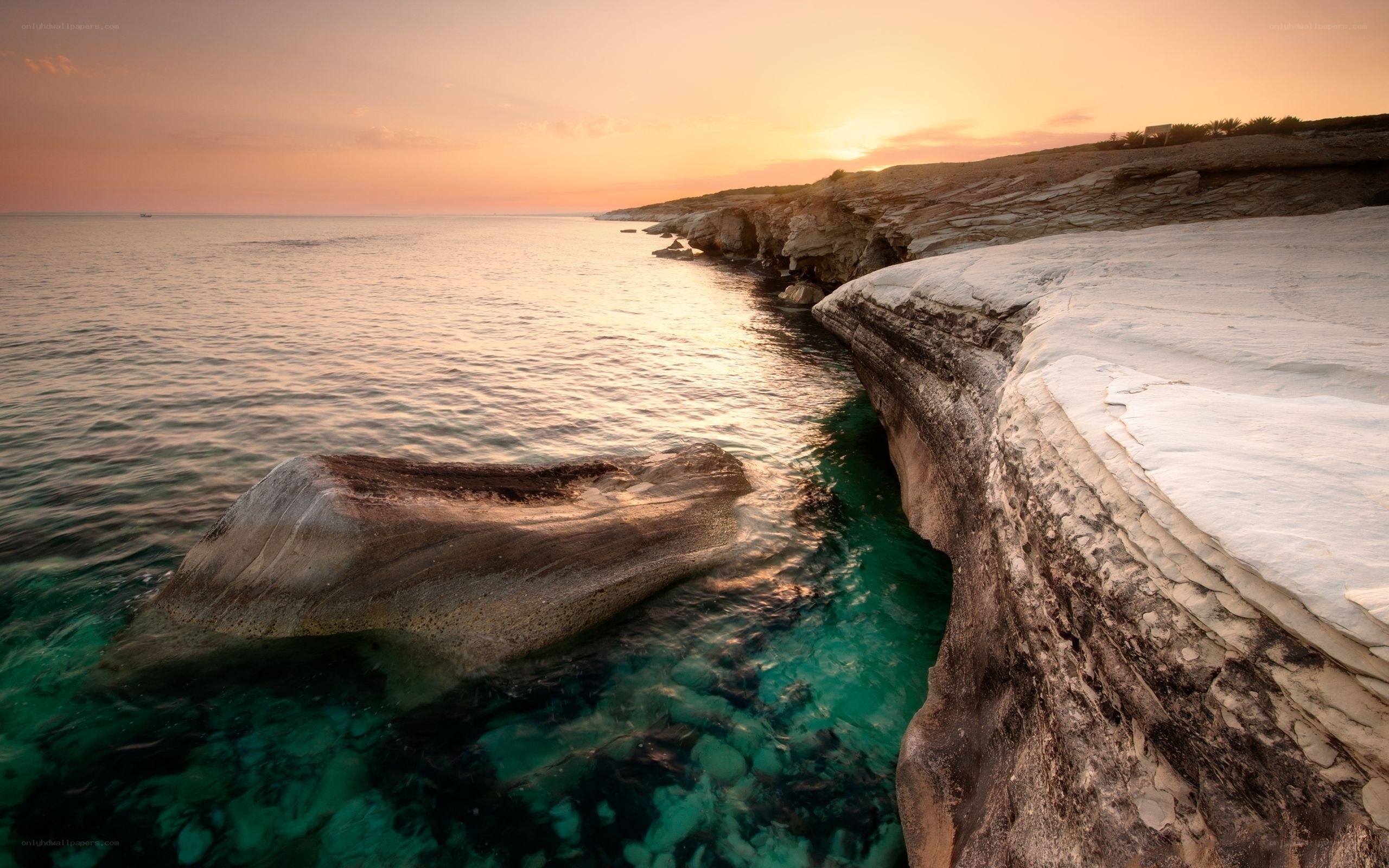 Sunset at coastal rock formations