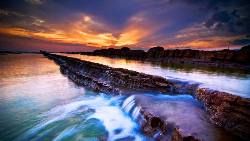 Sunset at coastal rock formations