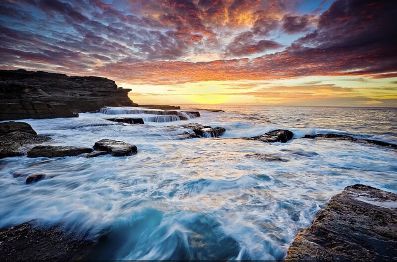 Sunset at coastal rock formations