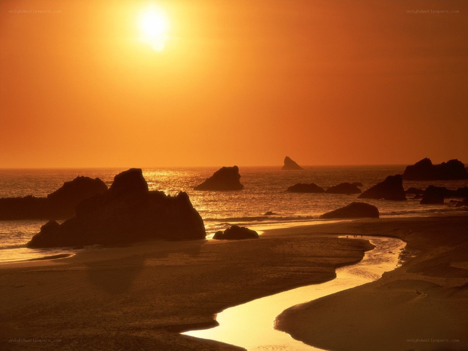 sunset at coastal rocks