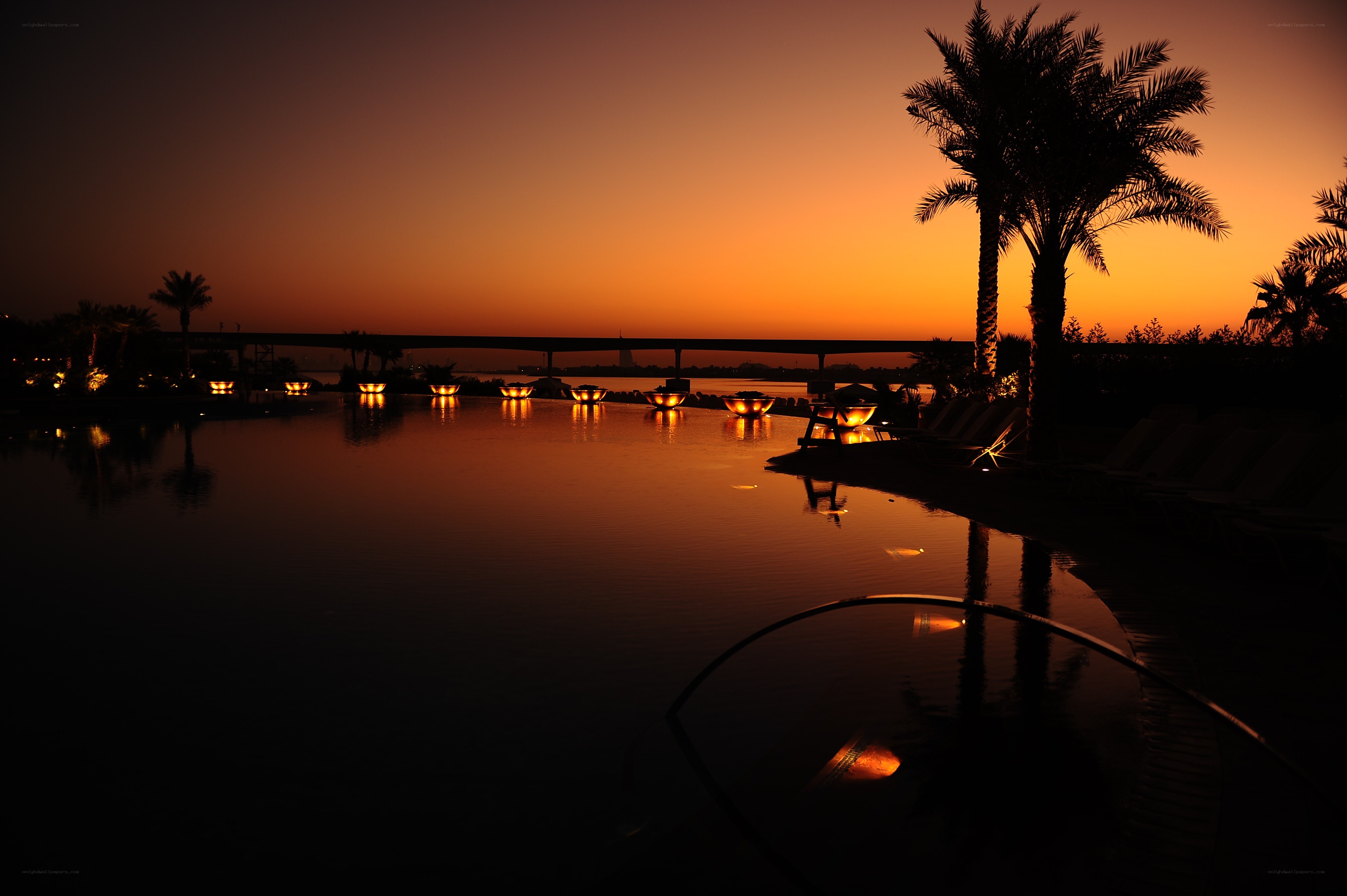 sunset at resort pool