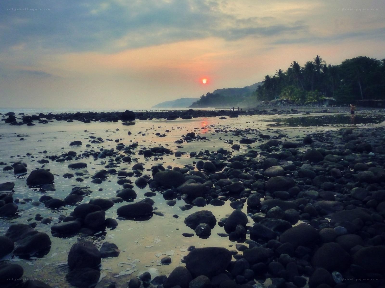 sunset at rocky beach