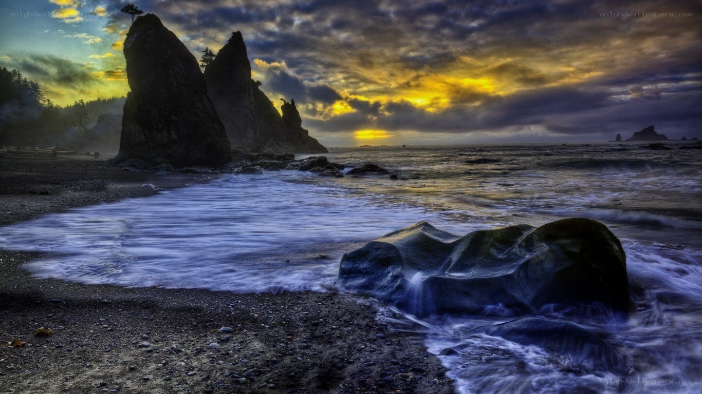 Sunset at rocky beach