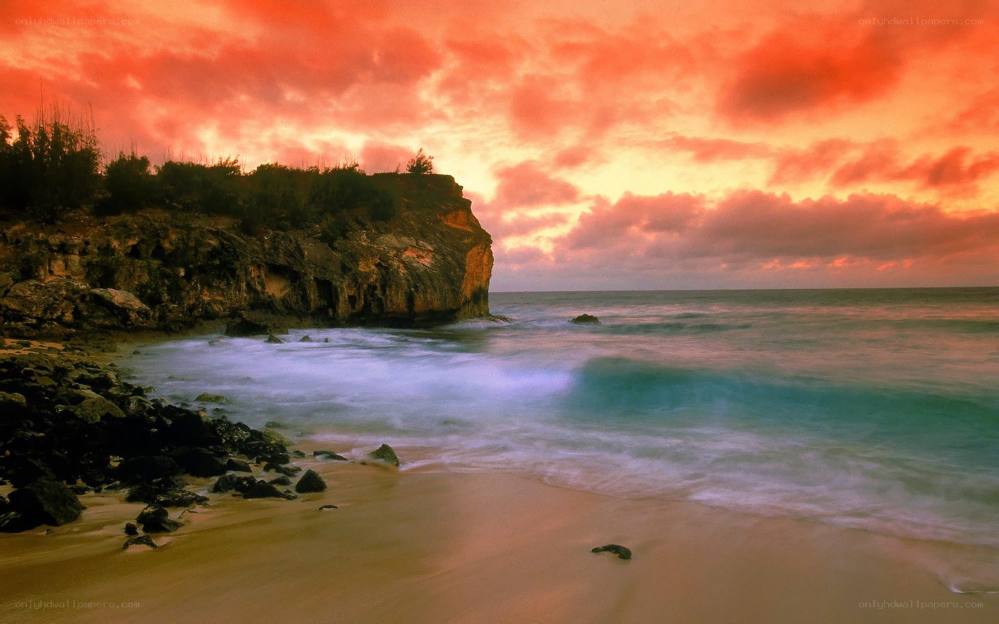 Sunset at rocky beach