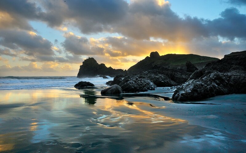 Sunset at rocky beach