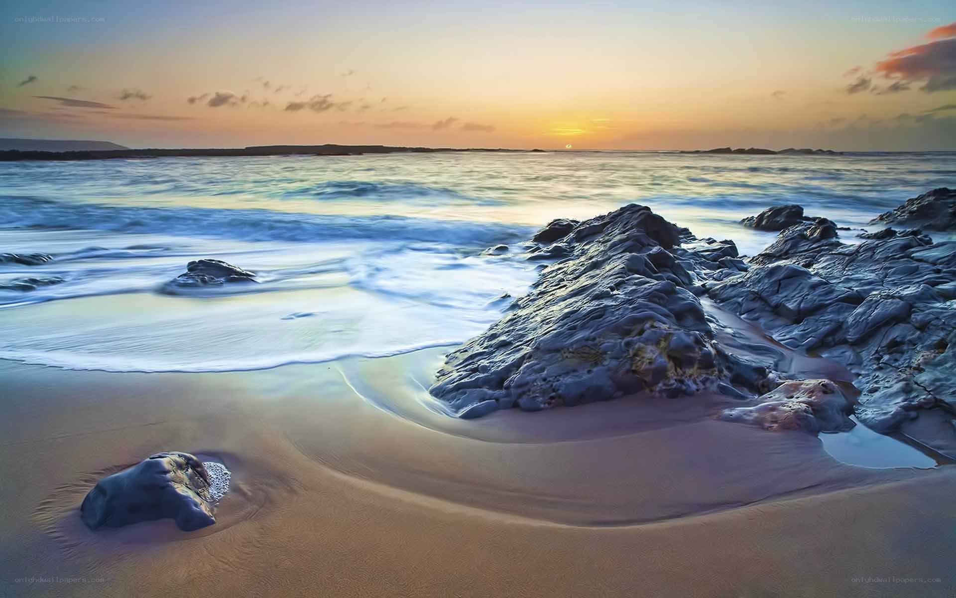 Sunset at rocky beach