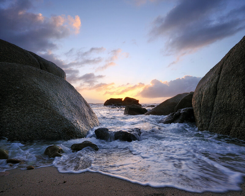 Sunset at rocky beach
