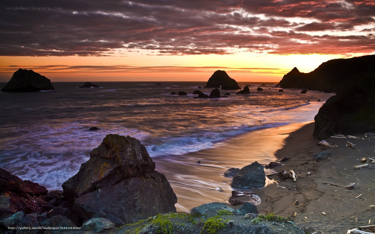 Sunset at rocky beach