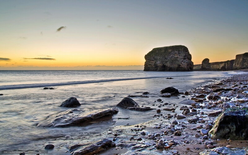 Sunset at rocky beach