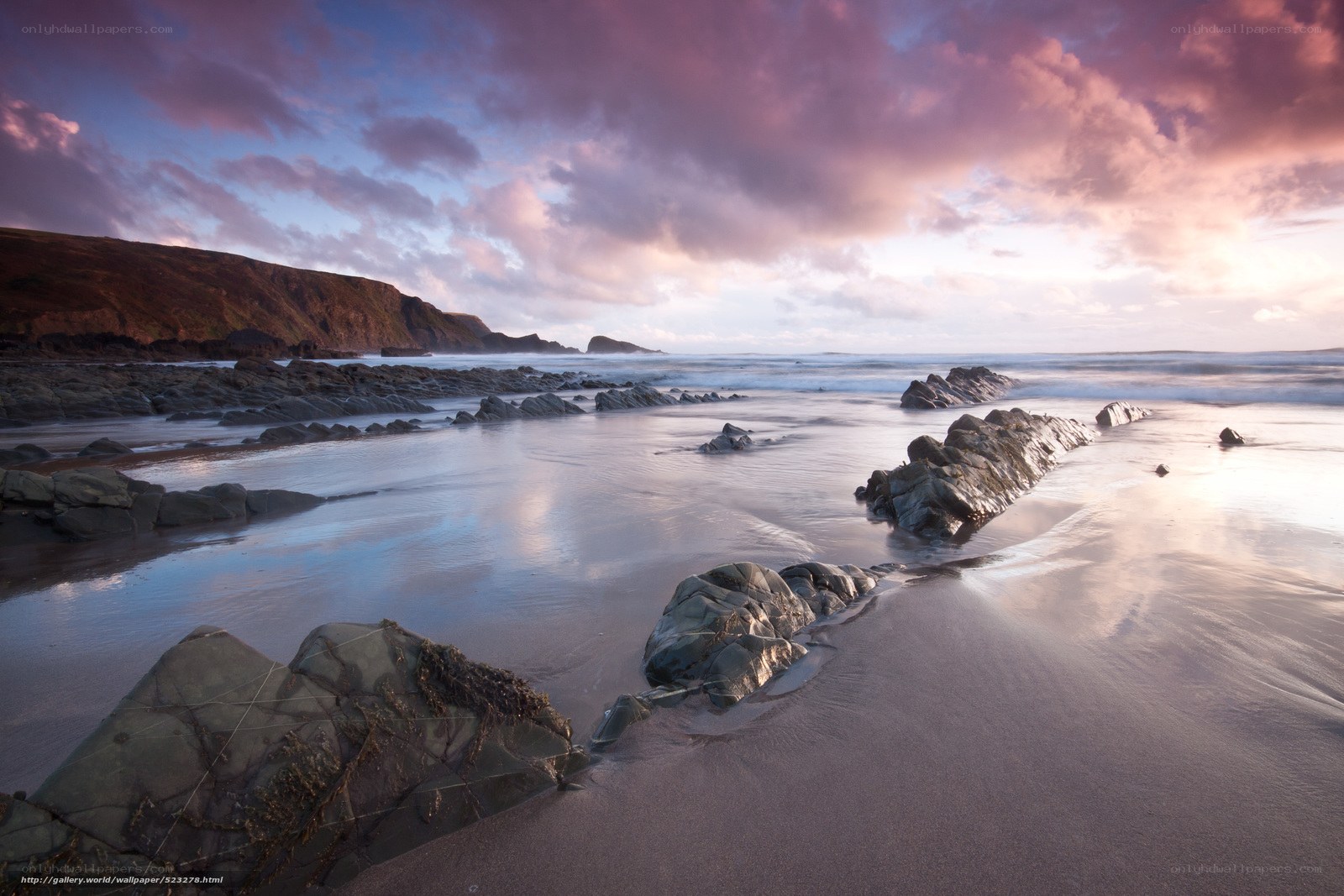Sunset at rocky beach