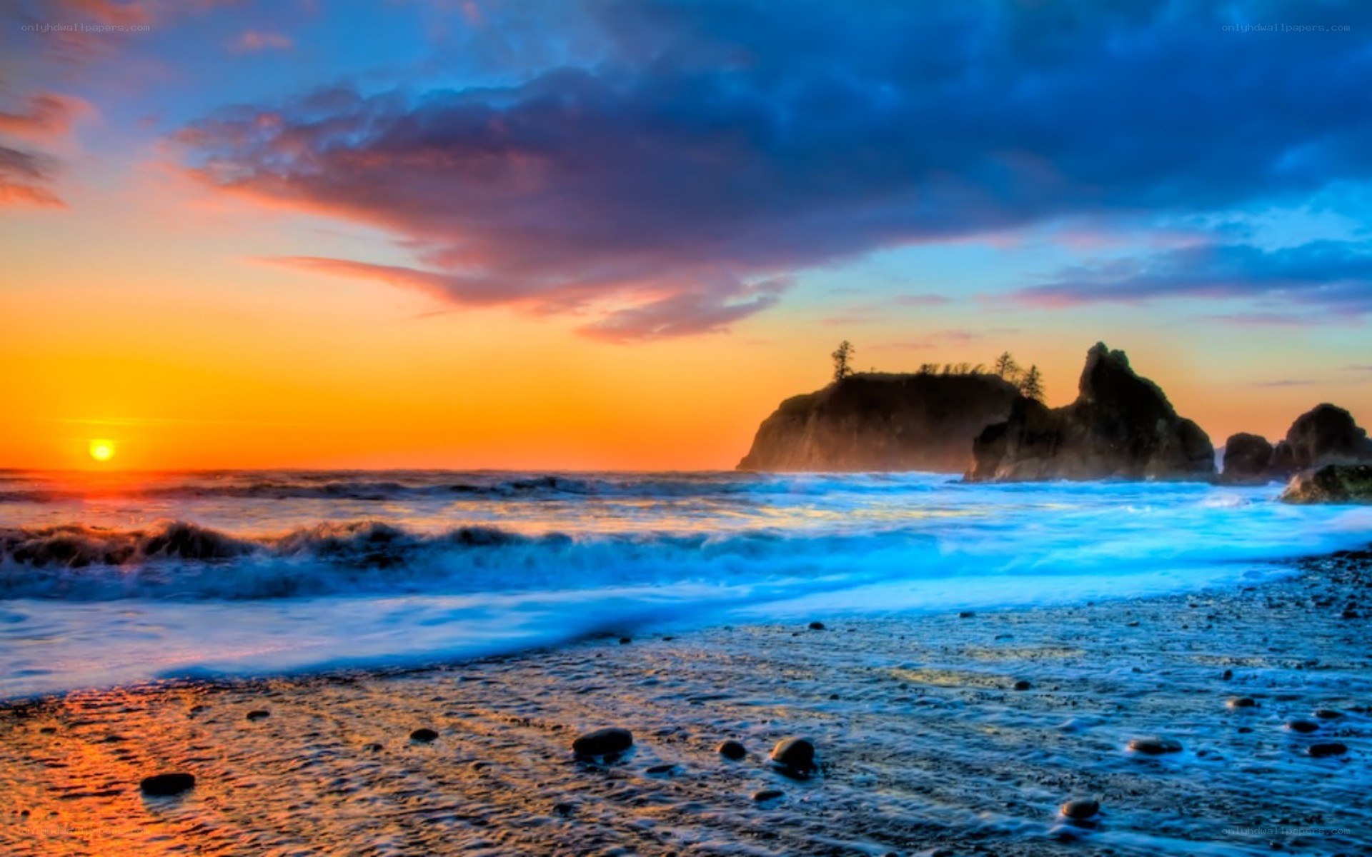 Sunset at rocky beach