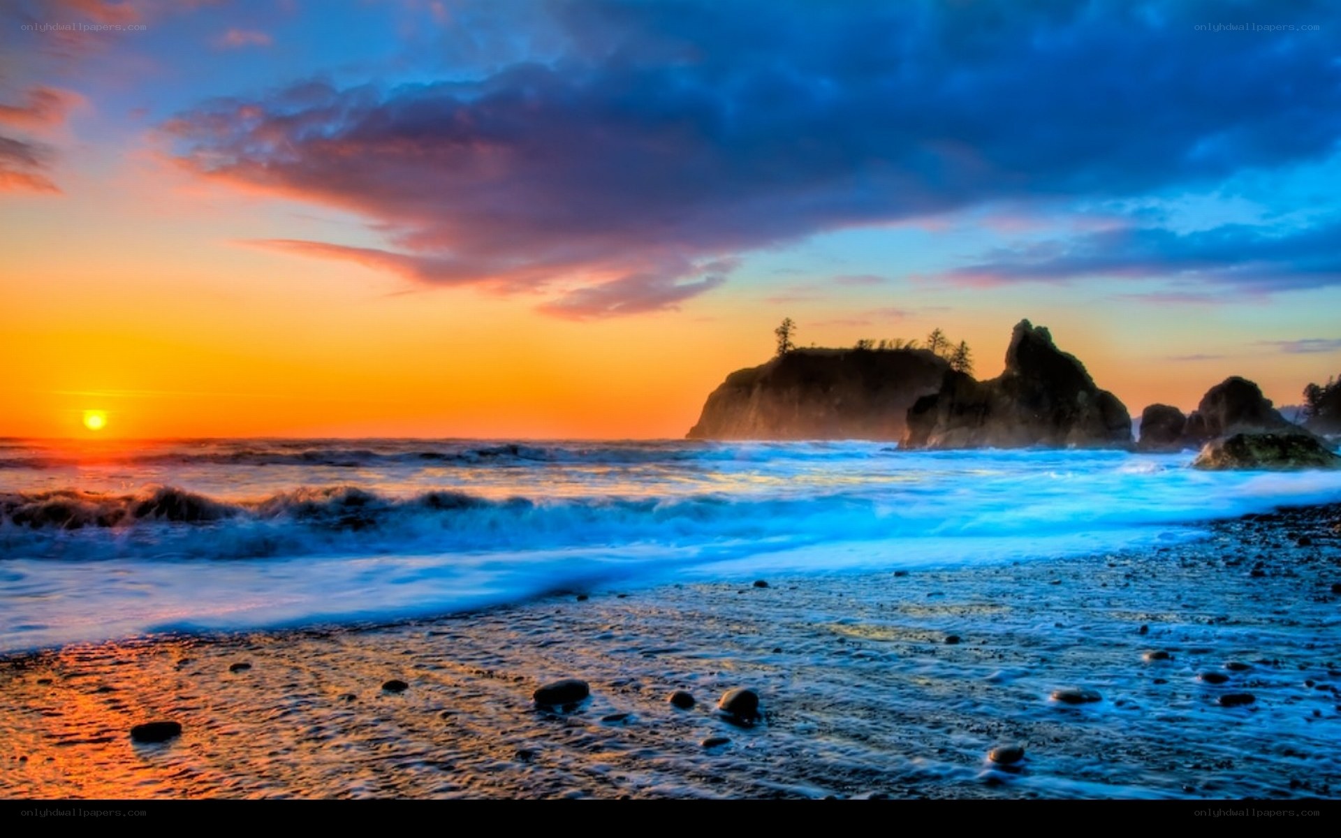 Sunset at rocky beach