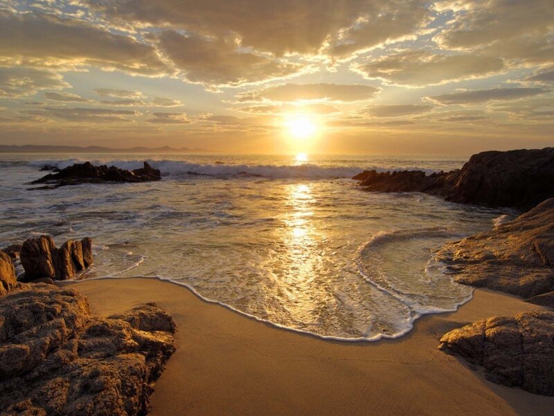 Sunset at rocky beach